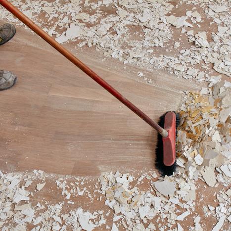 sweeping up Builder plaster 